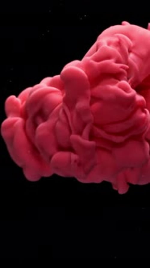 Peintures colorées sous l'eau filmées par une caméra haute vitesse à 1000 images par seconde