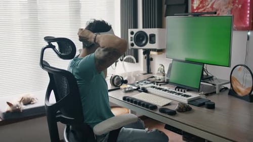 Music producer explores virtual reality while seated in high-tech audio production studio