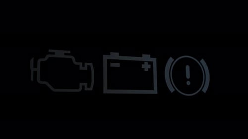 Car Dashboard Displaying Warning Indicator Light