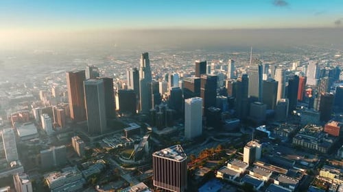 Mist covering the vast panorama of Los Angeles, California, USA. Sunny scenery of the city from top