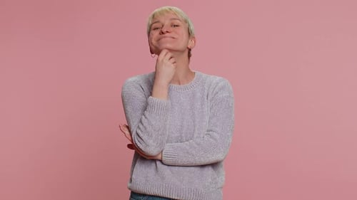 Adult Smiling and Posing Against Pink Background