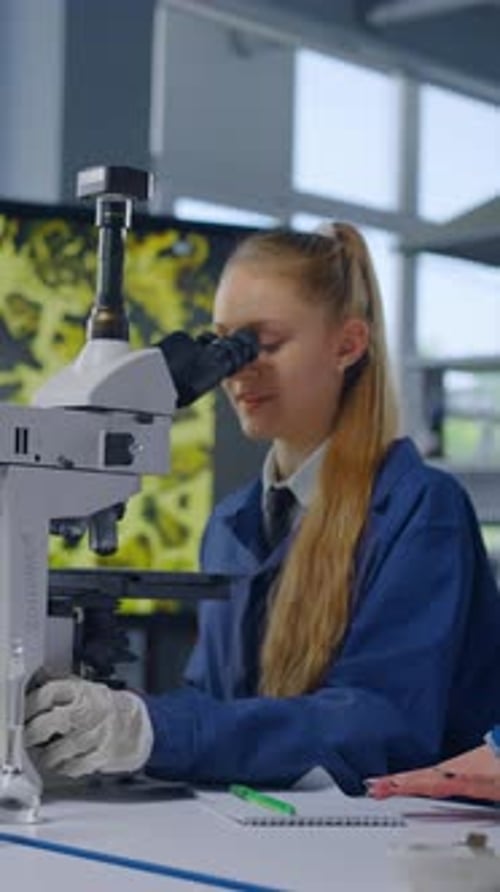 Teen Girl Student Working in a Scientific Laboratory