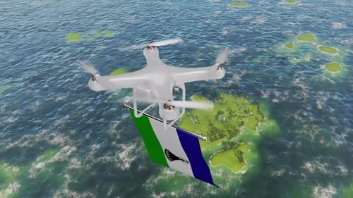 The Drone Flying With Lesotho Flag Above The Sea