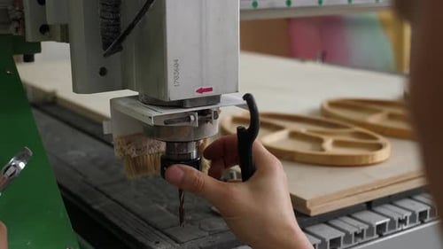 Close up Drill Press Being Adjusted in Factory