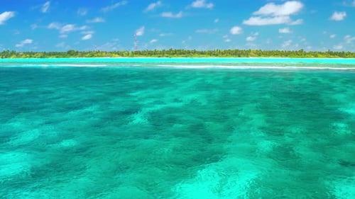 Beautiful View Turquoise Sea and Coral Reef on Tropical Island in the Maldives