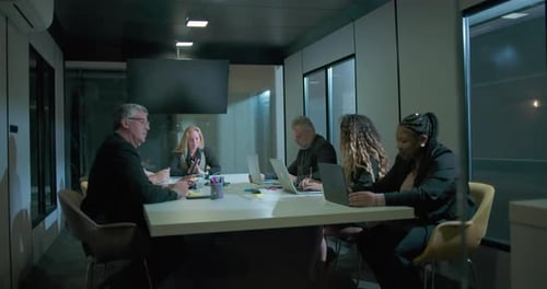 Business Team Meeting at Conference Table