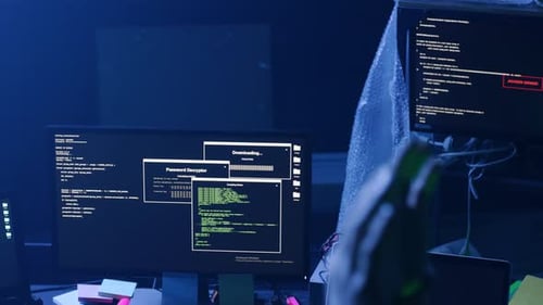 A HighTech Coding Workspace Set Within a Dark and Futuristic Environment for Innovation