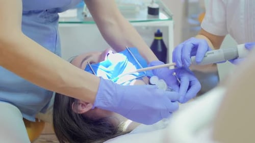 Advanced Tooth Filling Procedure by Dentists Using Rubber Dam