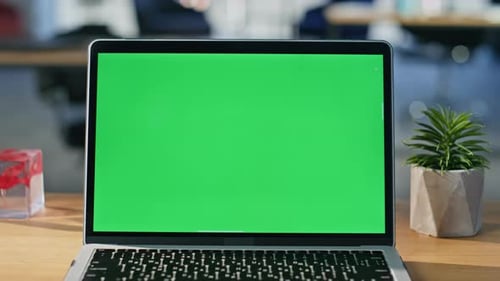 Chroma Key Laptop Placed on Modern Workspace Closeup Green Screen Computer