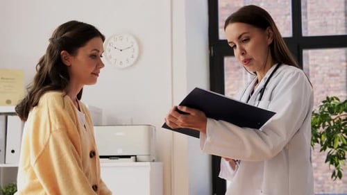 Doctor Discusses Medical Results with a Female Patient