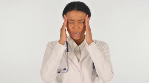Woman Doctor Experiencing Headache