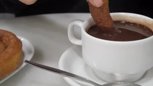 Churros in Hot Relaxing Cafe Ambiance in Madrid, Spain