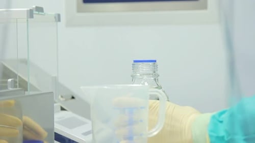 Laboratory Worker Preparing to Perform Experiment at Lab. Close Up of Female