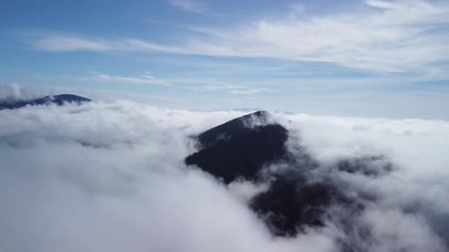 Aerial Panoramic Shot Above Clouds in Mountain Landscape
