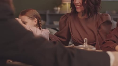 Happy Family Celebrates Birthday with Gifts and Treats