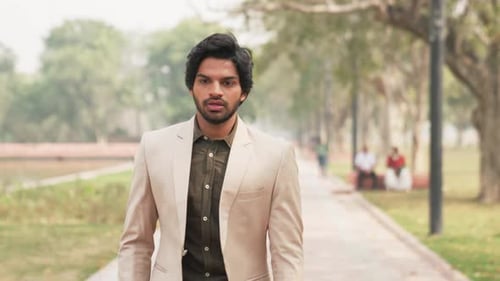 Stressed Indian Businessan Walking