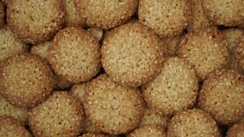 Top View of Sweet Cookies with Sesame Rotate on Tray Fresh Baked Shortbread