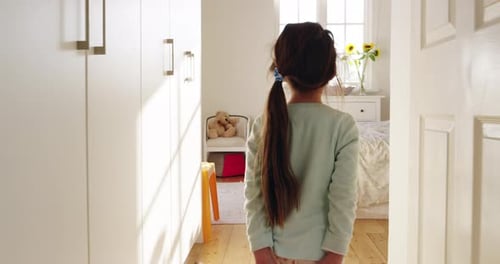 Child Jumps on Bed with Sleeping Adult