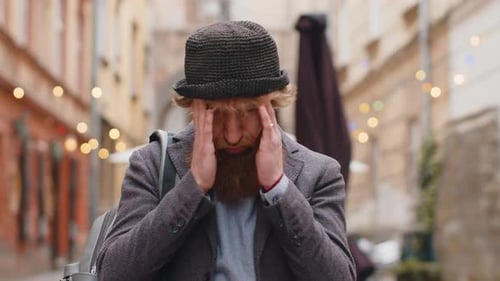 Sad Unhappy Frustrated Young Man Walking Alone in City Street Feeling Bad Annoyed Grief Problem
