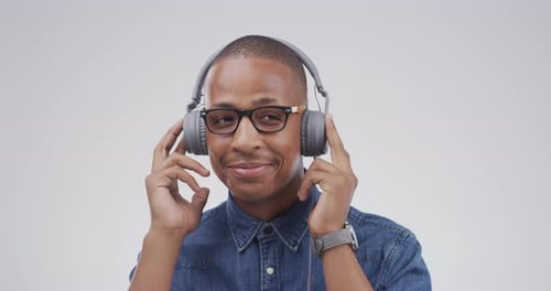 Man Listening to Music on Headphones