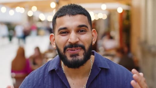 Young Man Looking Surprised at Camera Shocked By Sudden Win Good Victory News Wow in City Street