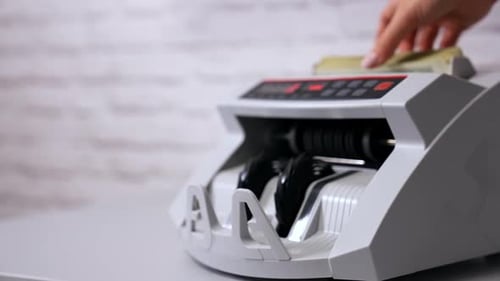 Electronic counting machine. Counter machine with US money banknotes of 100 dollars