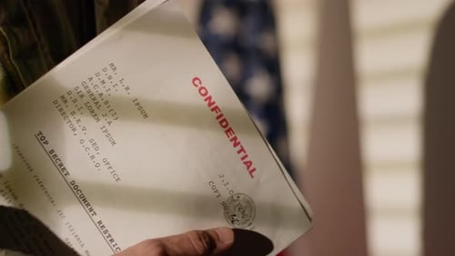 American Military Office with Military Man Holding Documents