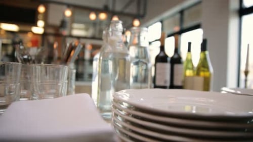 Plates Silverware Napkins and Wine Glasses Buffet Table Absence