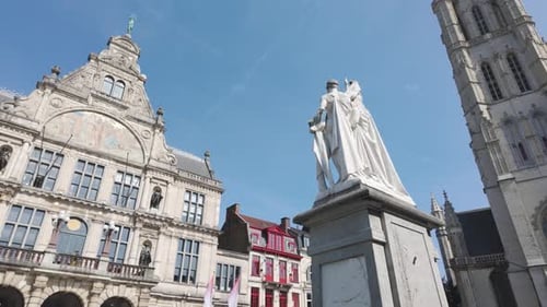 Sunny Ghent view featuring Saint Bavo's Cathedral and Royal Dutch Theater facade