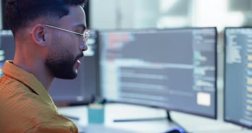 Man, computer screen and coding for software development or programming website for cyber security