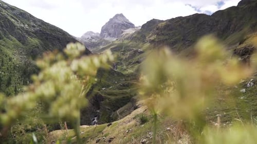 Picturesque view of a high mountain peak in the middle of the beautiful alps. Low angle, wide shot o