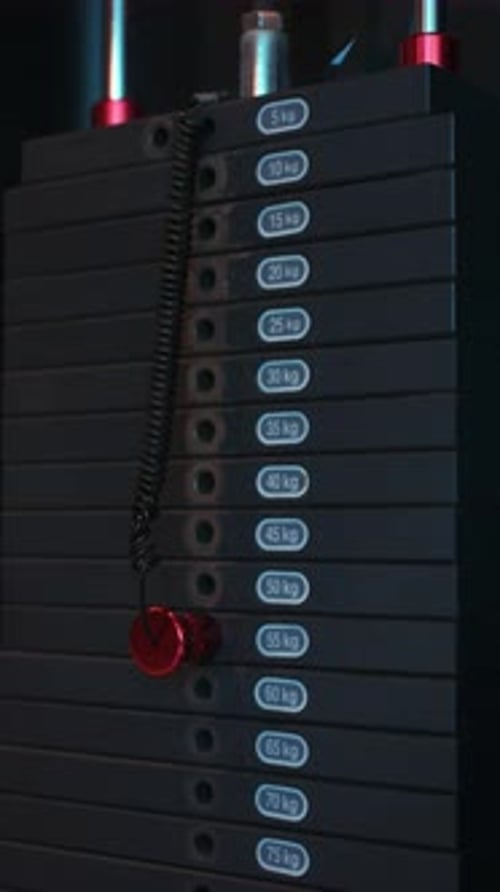 Weight Stack Adjustment at the Gym