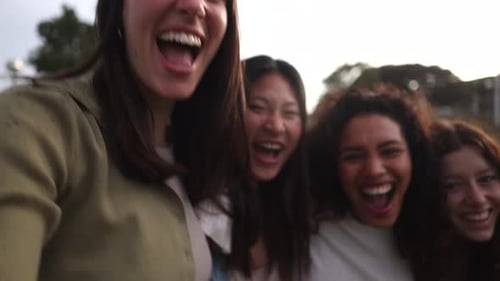 Happy Young Women Laughing Together Outdoors