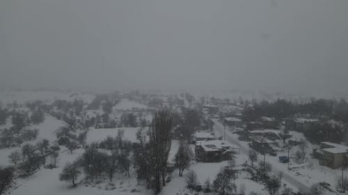 Snowfall On The Village
