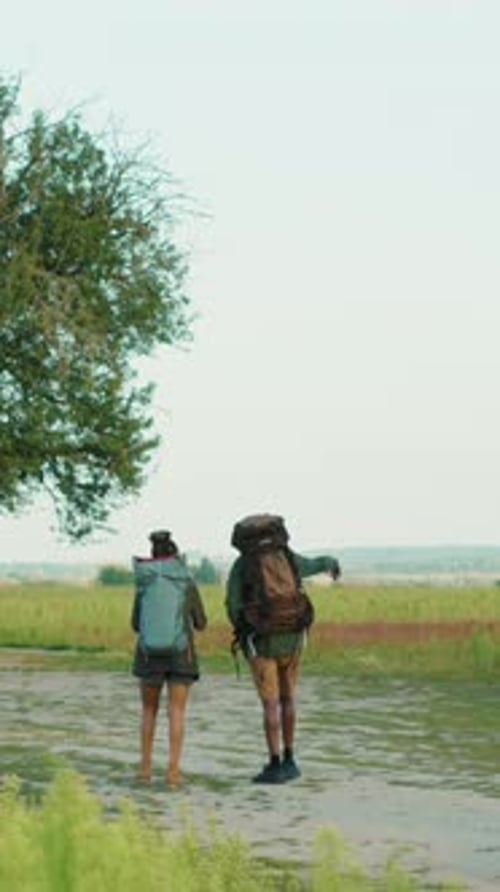 Adventurous Hikers Journeying Along a Beautiful and Scenic Trail in Natures Embrace