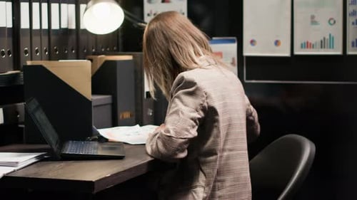 Detective at Office Workstation