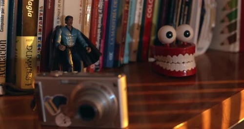 Close Up Rack Focus of Retro Camera and Nostalgic Toys