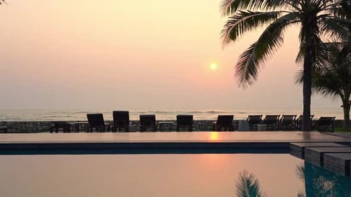 Serenity Above Tropical Sea and Luxury Poolside With Sunset Sunlight, Palm Tree and Calm Water, Full