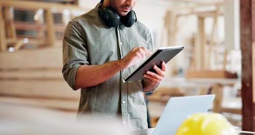 Man, architecture and tablet to browse internet for building research and ideas or design