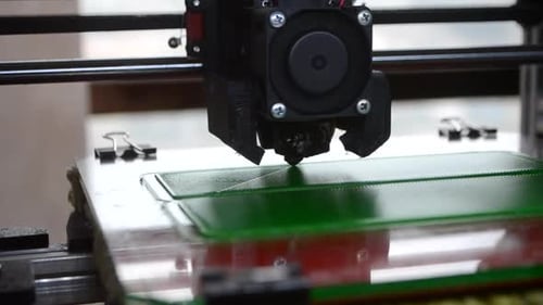 3D Printer Printing Prototype From Molten Plastic Process of Creating Model