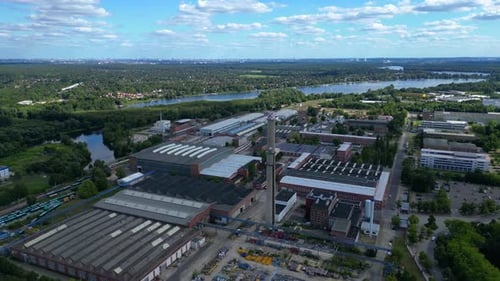 Industrial Park With Old Factory Buildings And Modern Office Spaces