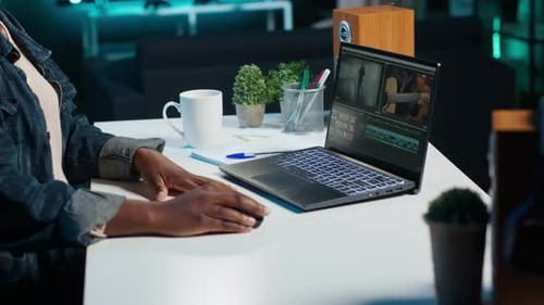 Post Production Studio Employee Working with Raw Footage
