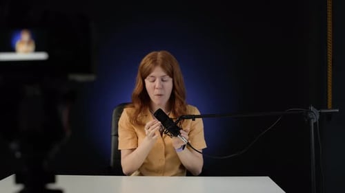 Woman Preparing for Video Recording