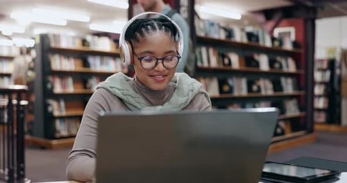 Girl, student and headphones with laptop in library for assignment essay