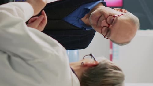 Doctor Explaining to Patient in Medical Office