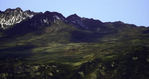Stunning View of Rugged Mountains and Lush Green Valleys in Daylight