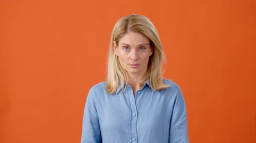 Woman Showing Frustration with a Facepalm