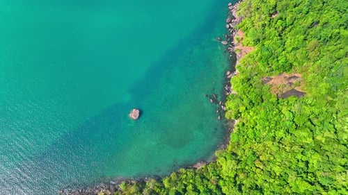 An aerial view reveals the beauty of a tropical island in Thailand. 4K.
