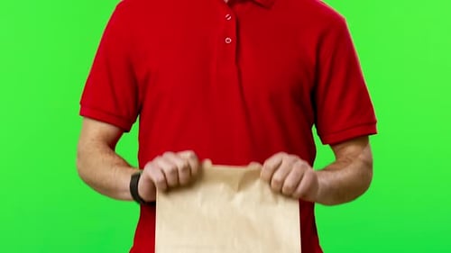 Courier Holding Recyclable Craft Paper Bag with Food Order
