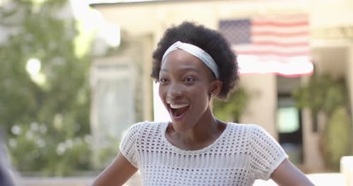 Woman Greets Military Man with an Enthusiastic Embrace